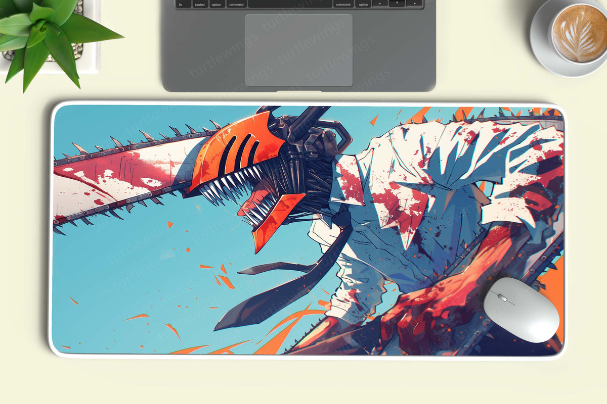 Denji Chainsaw Man anime art mousepad with orange chainsaw head, blood splatter, and blue background at a desk