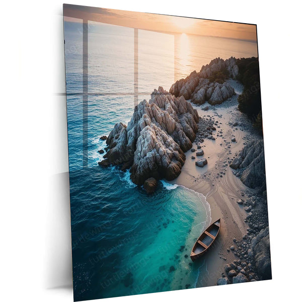 Serene Sunset Cove with Wooden Rowboat and Rocky Shoreline Metal Frame | Aerial Coastal Wall Art - TURTLEWINGS 